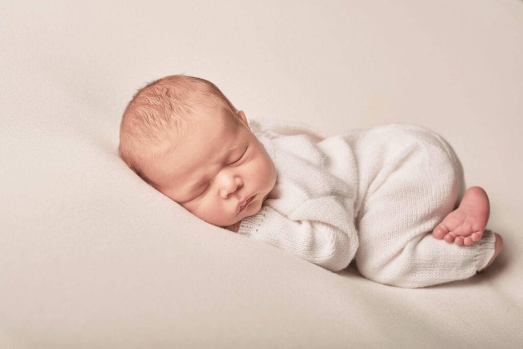 why do babies sleep with their butt in the air