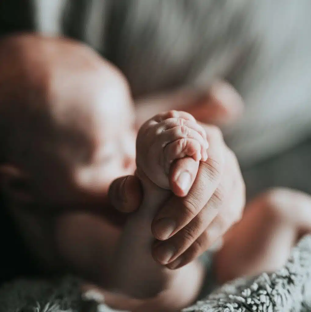 baby won't sleep unless held