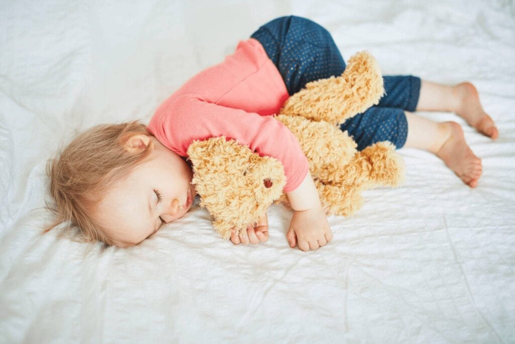 when can a baby sleep with a stuffed animal