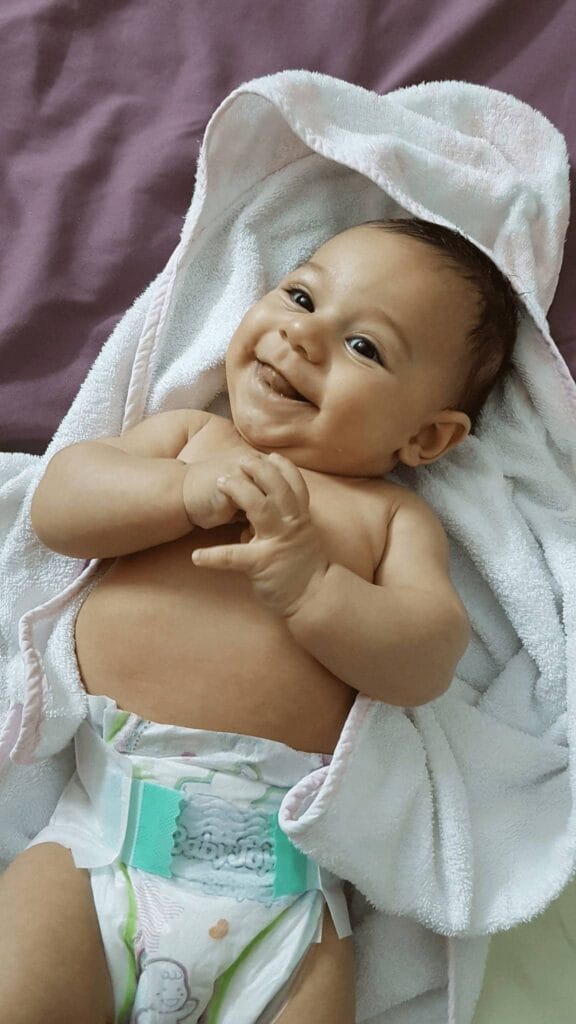 how to put on a diaper
